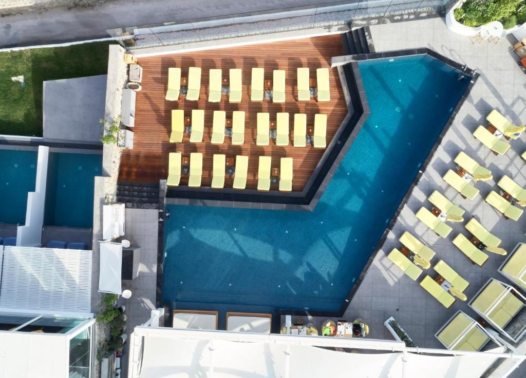an overhead view of a swimming pool at Myconian Korali Relais & Chateaux in Mikonos