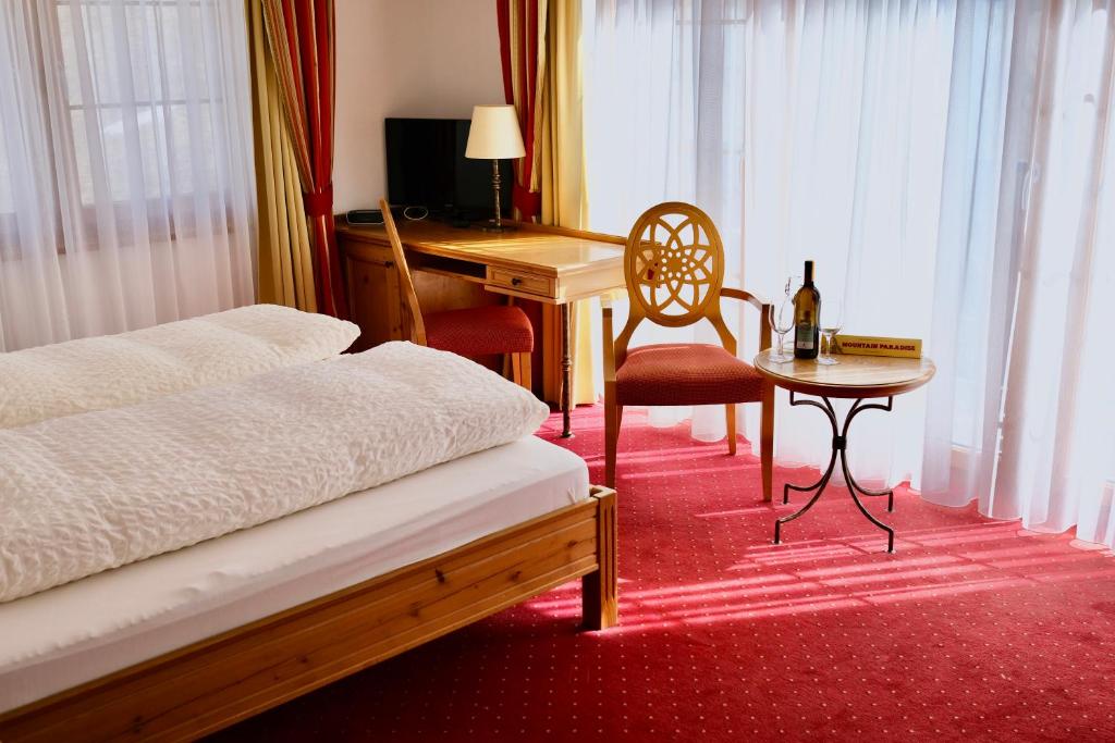 Ein Bett oder Betten in einem Zimmer der Unterkunft Mountain Paradise