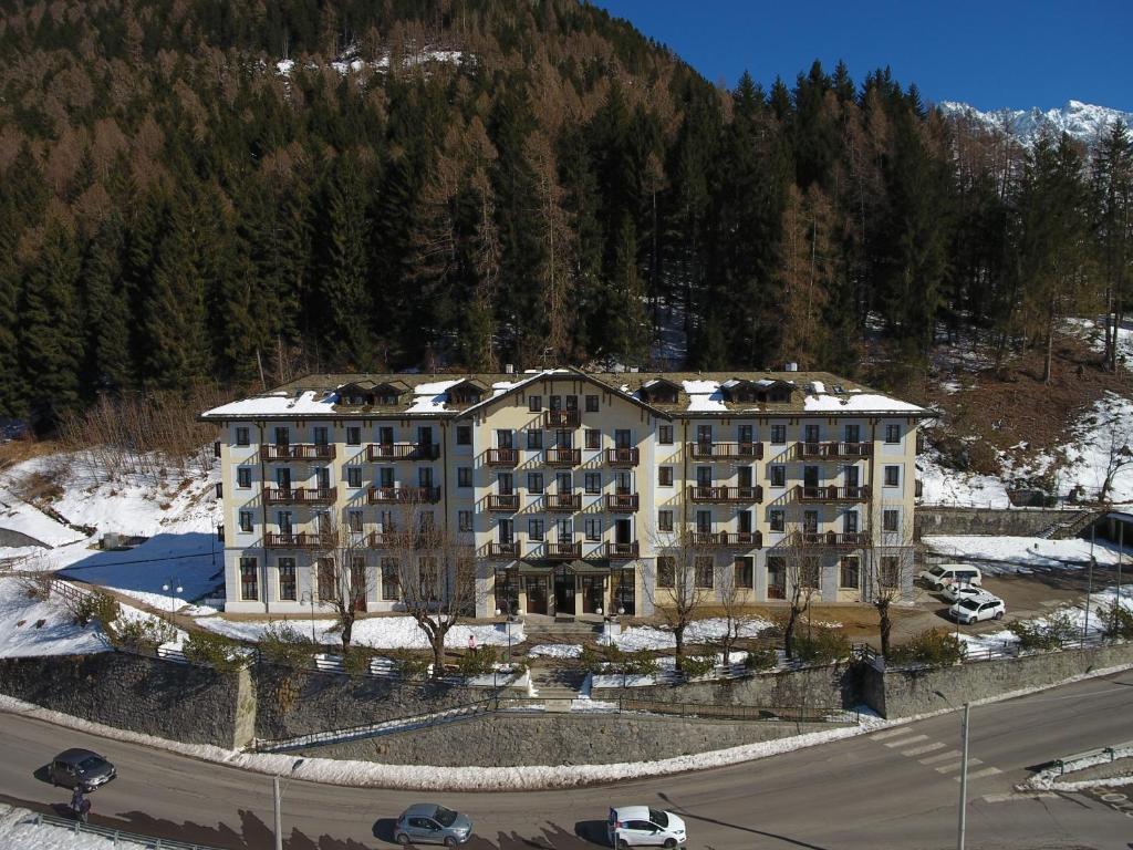 an aerial view of a large building in the snow at Palace Pontedilegno Resort in Ponte di Legno