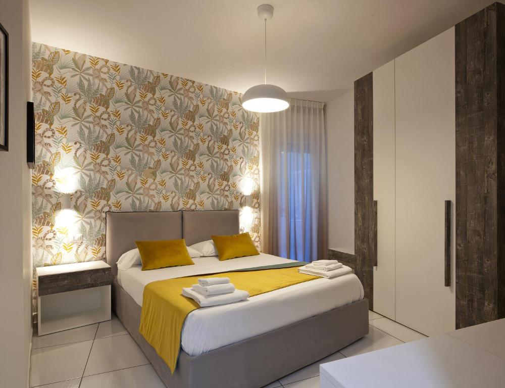 Postel nebo postele na pokoji v ubytování YourHome - Maison Nonna Anna