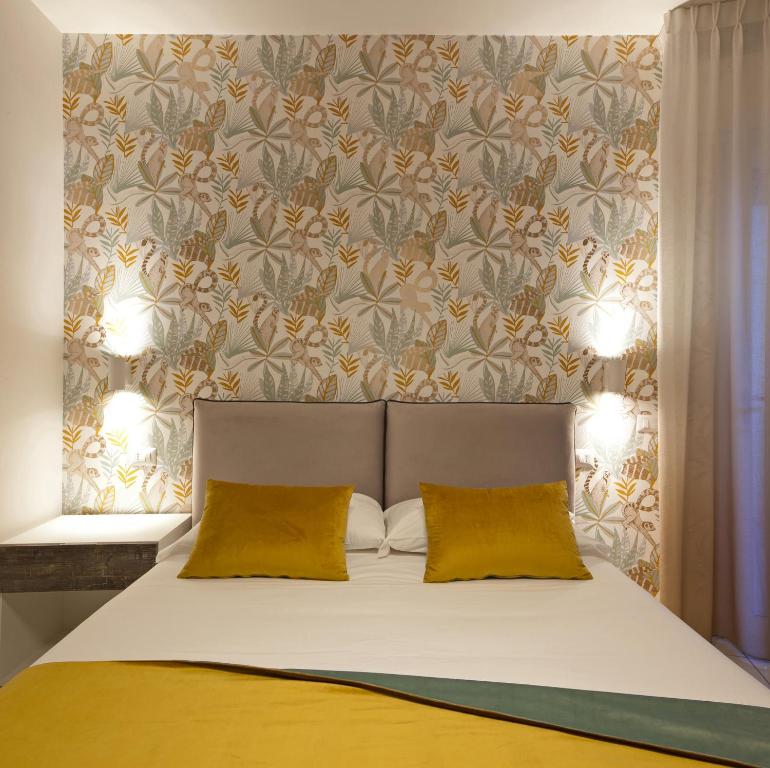 Postel nebo postele na pokoji v ubytování YourHome - Maison Nonna Anna