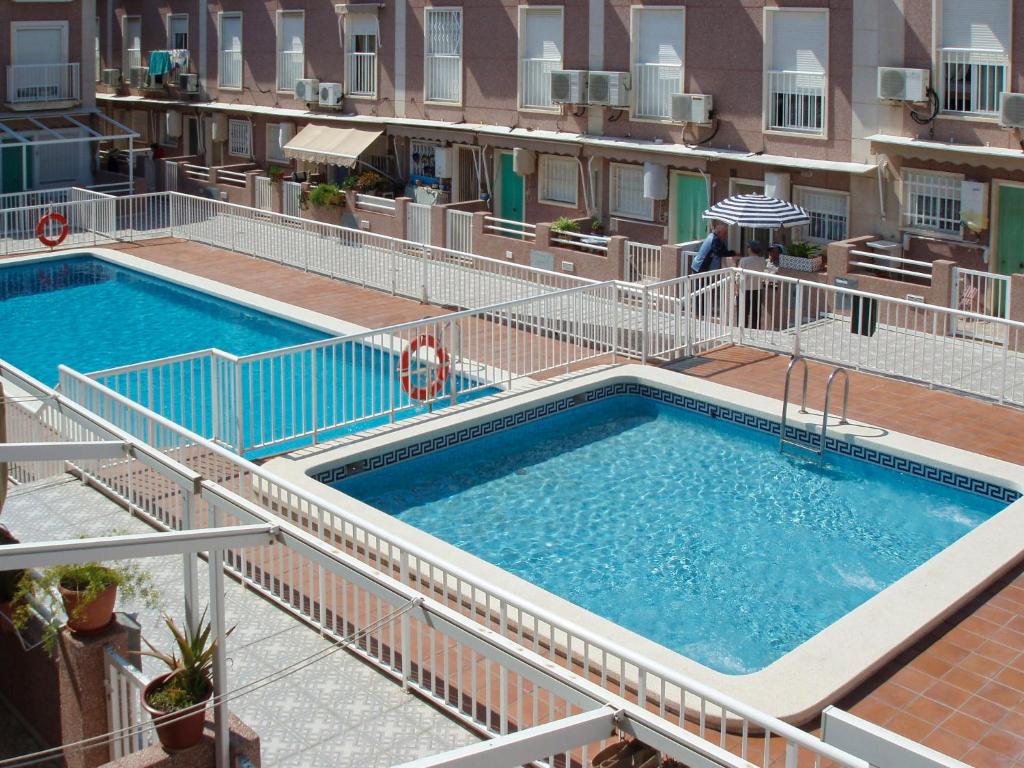 an overhead view of a swimming pool in a building at Holiday Home Tamarit Beach by Interhome in Santa Pola