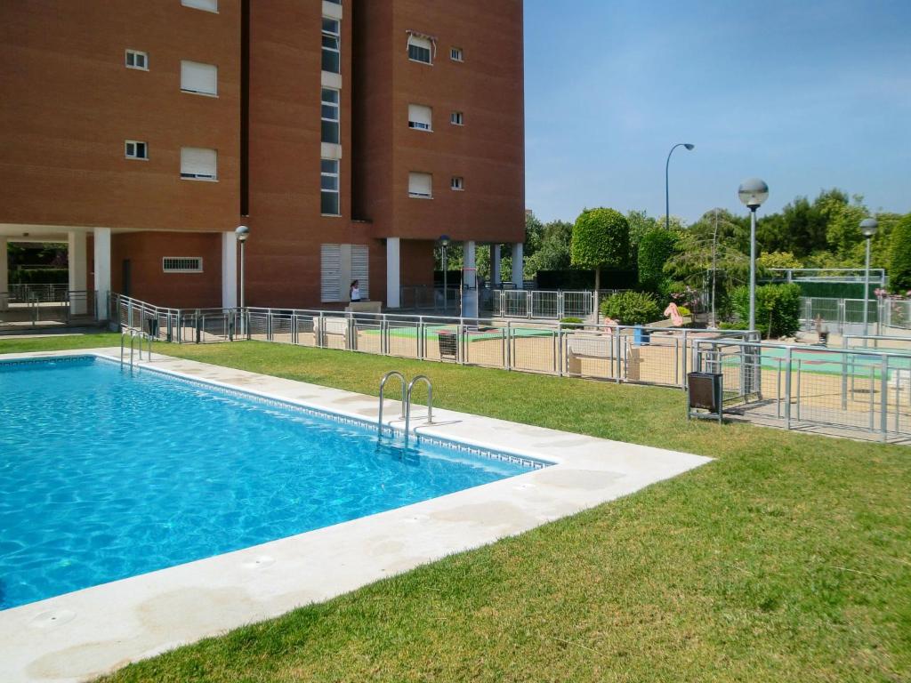 una piscina di fronte a un edificio di Apartment Lo Morant Costa Alicante by Interhome ad Alicante