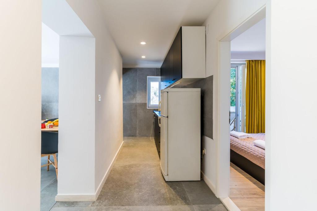 Postel nebo postele na pokoji v ubytování Lapad bay luxury apartment