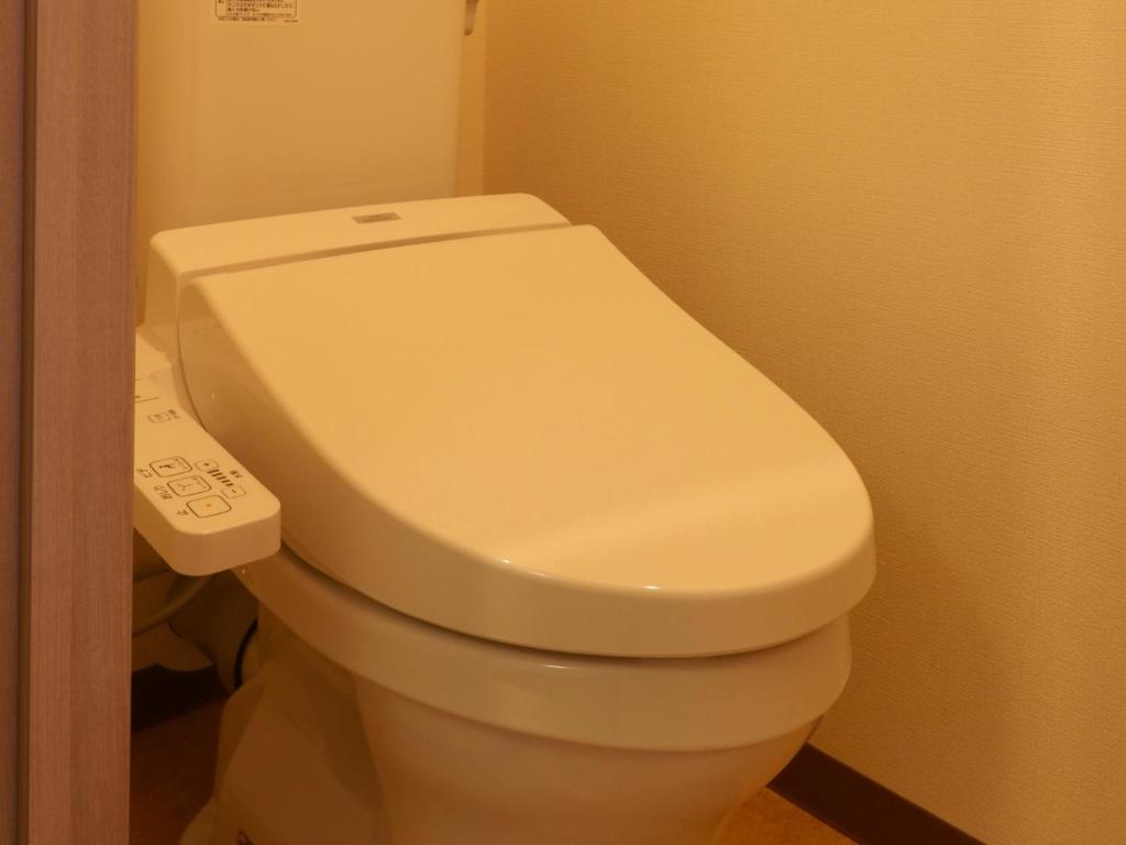 Koupelna v ubytování Hotel Asahi Grandeur Fuchu