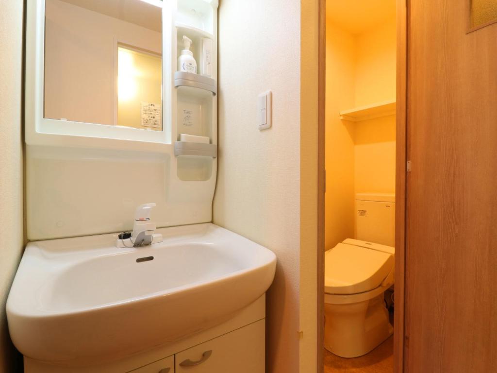 Koupelna v ubytování Hotel Asahi Grandeur Fuchu