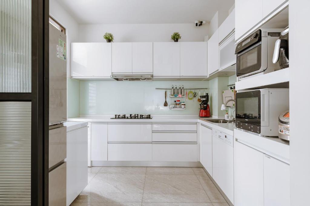 Η κουζίνα ή μικρή κουζίνα στο ChingTian YunShe Homestay