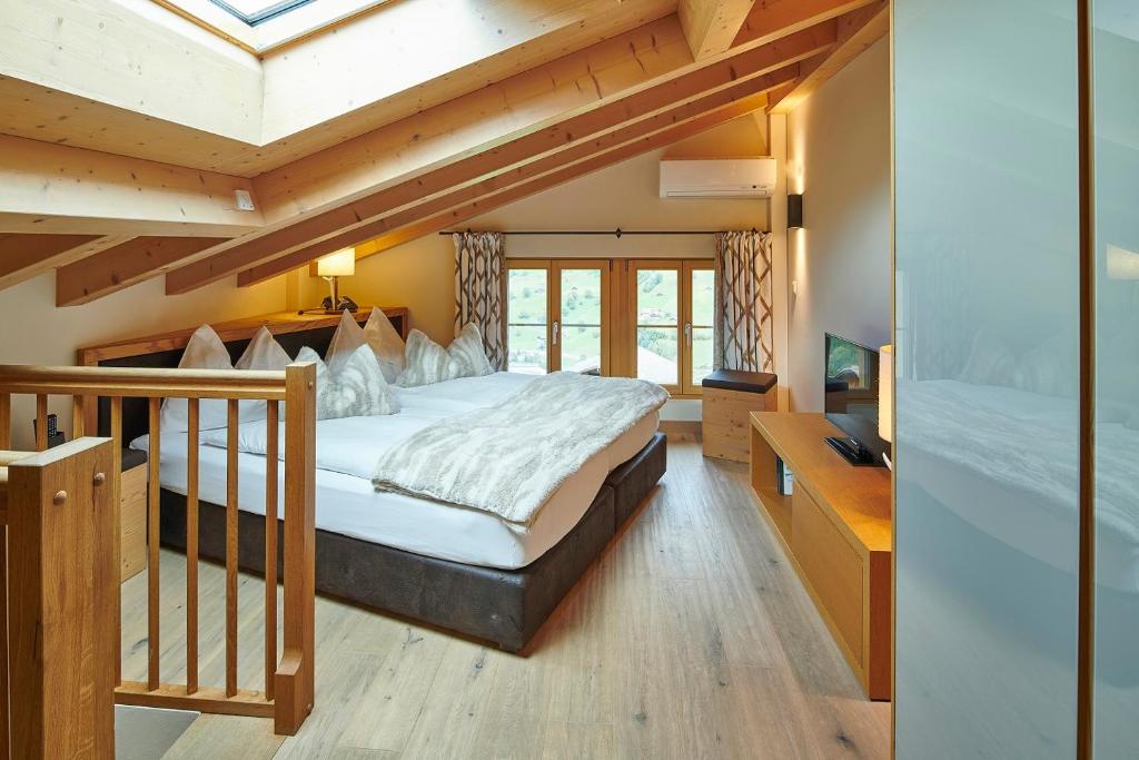 Postel nebo postele na pokoji v ubytování Aspen Alpine Lifestyle Hotel