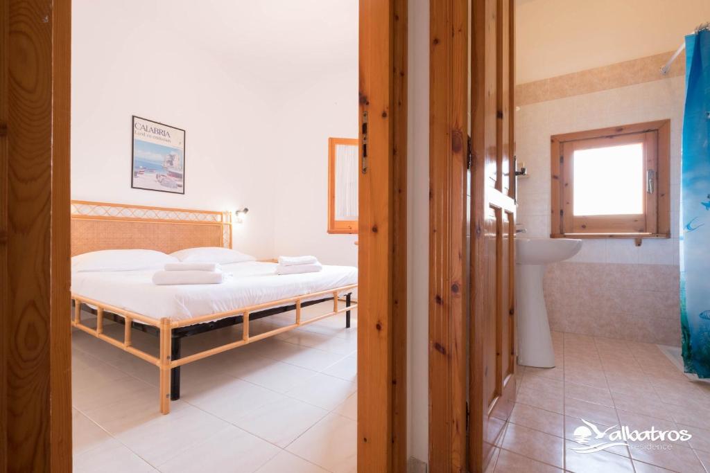 Postel nebo postele na pokoji v ubytování Residence Albatros