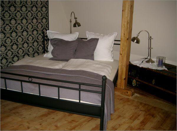 Tempat tidur dalam kamar di Ferienhaus am Wattenmeer