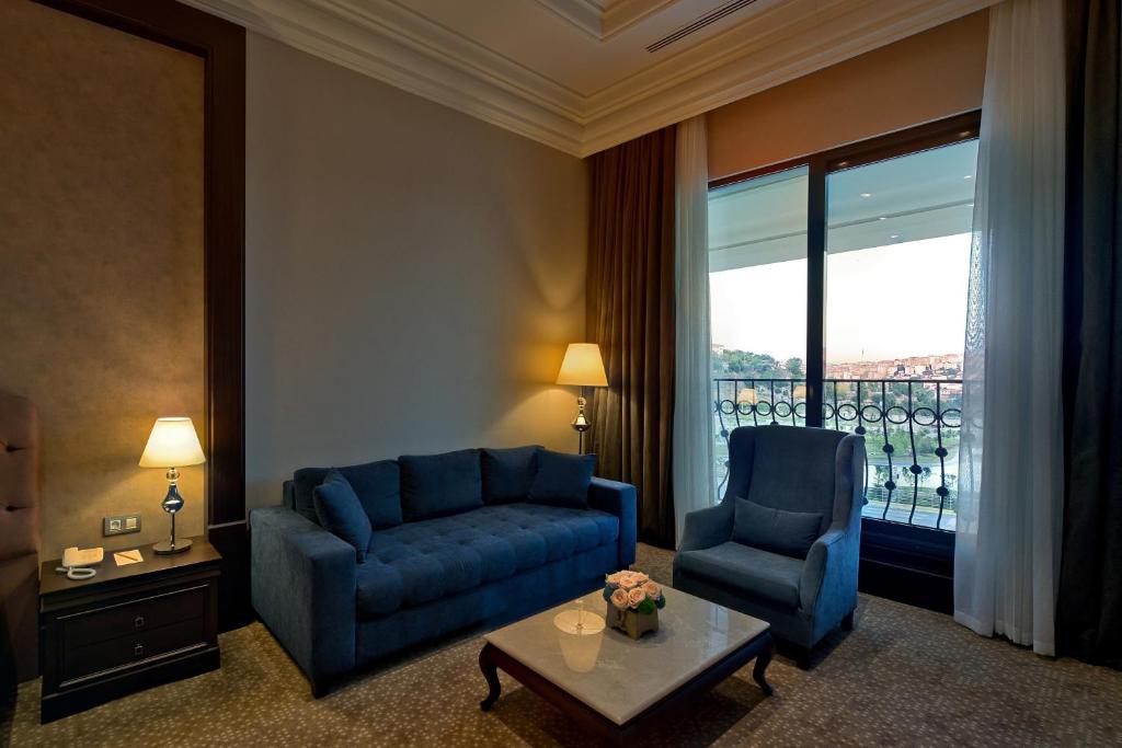 Posezení v ubytování Vialand Palace Hotel