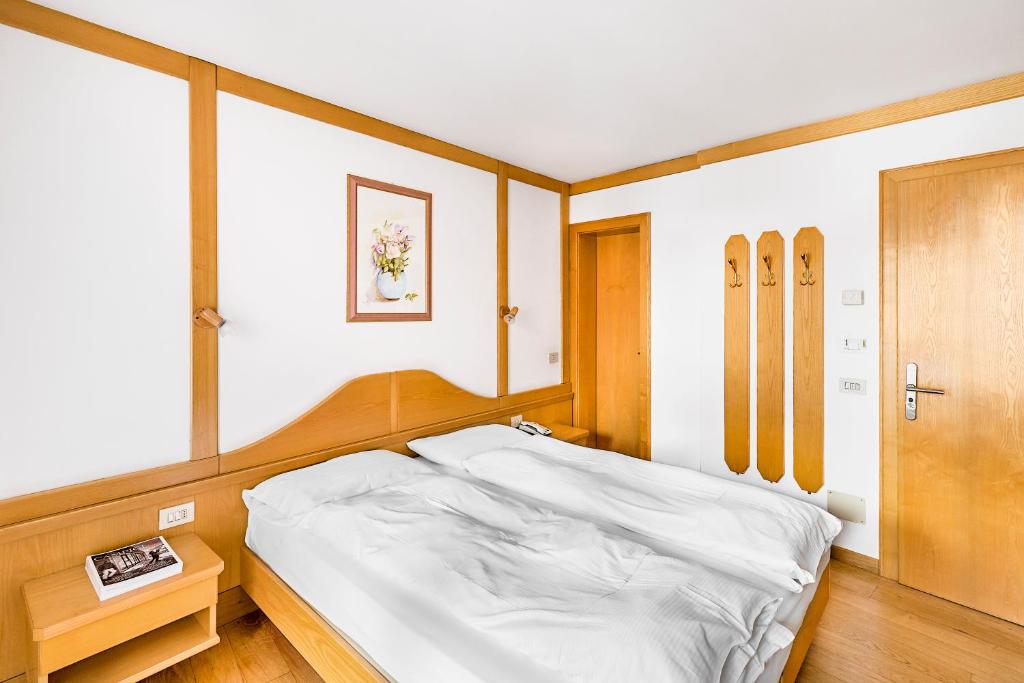 Postel nebo postele na pokoji v ubytování Hotel Cristiania