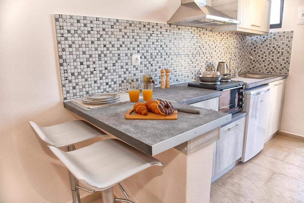Kuchnia lub aneks kuchenny w obiekcie Costas apartments