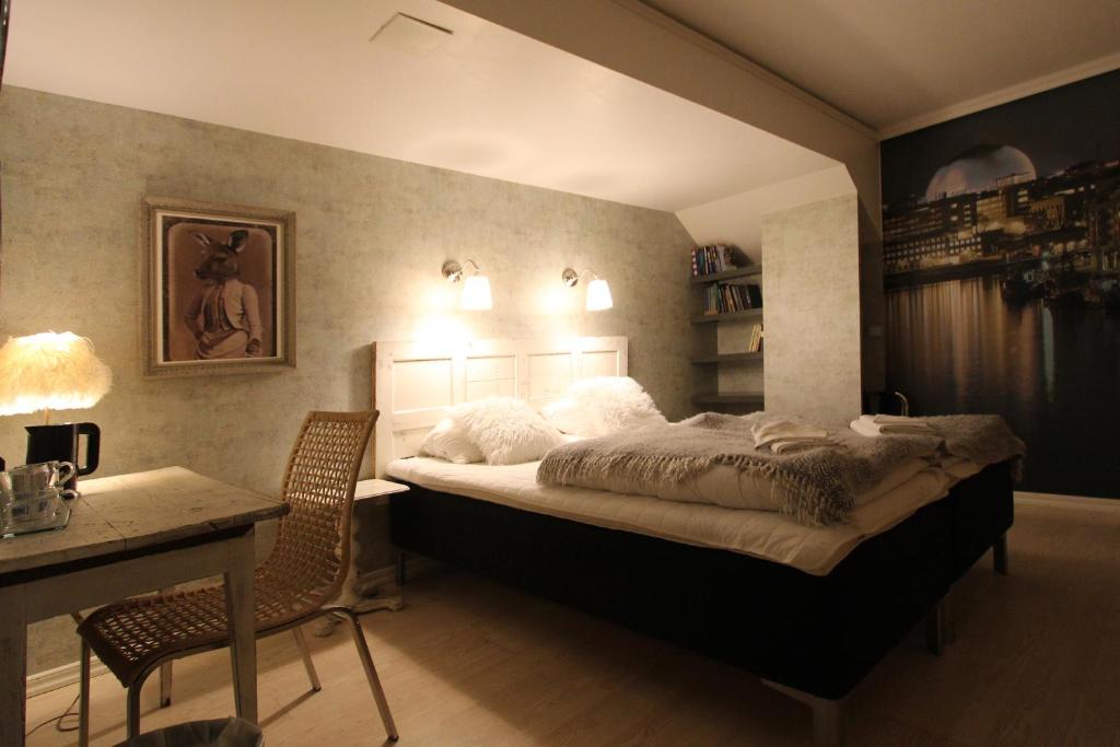Postel nebo postele na pokoji v ubytování Skanstulls Boutique Hostel