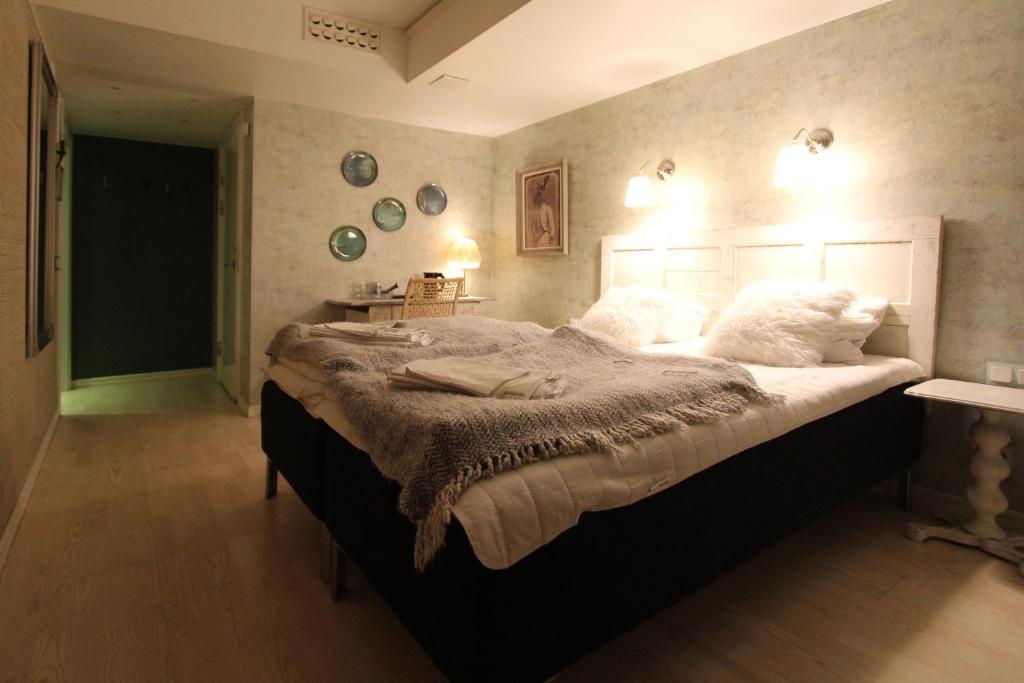 Postel nebo postele na pokoji v ubytování Skanstulls Boutique Hostel