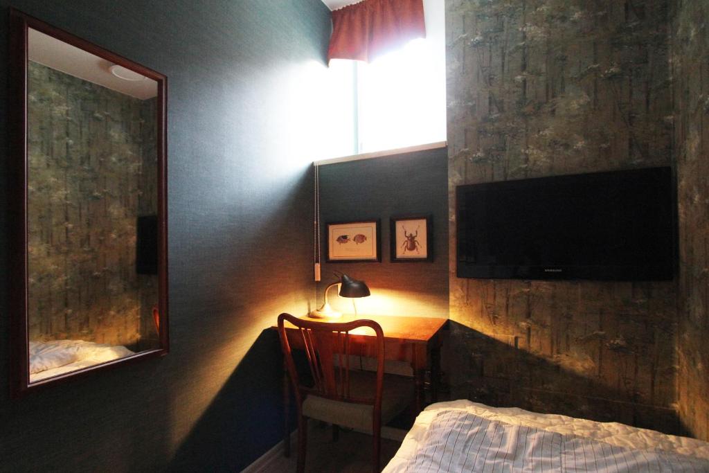 TV a/nebo společenská místnost v ubytování Skanstulls Boutique Hostel