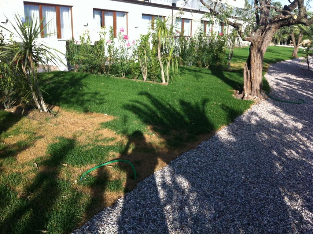 A garden outside Eurocongressi Hotel