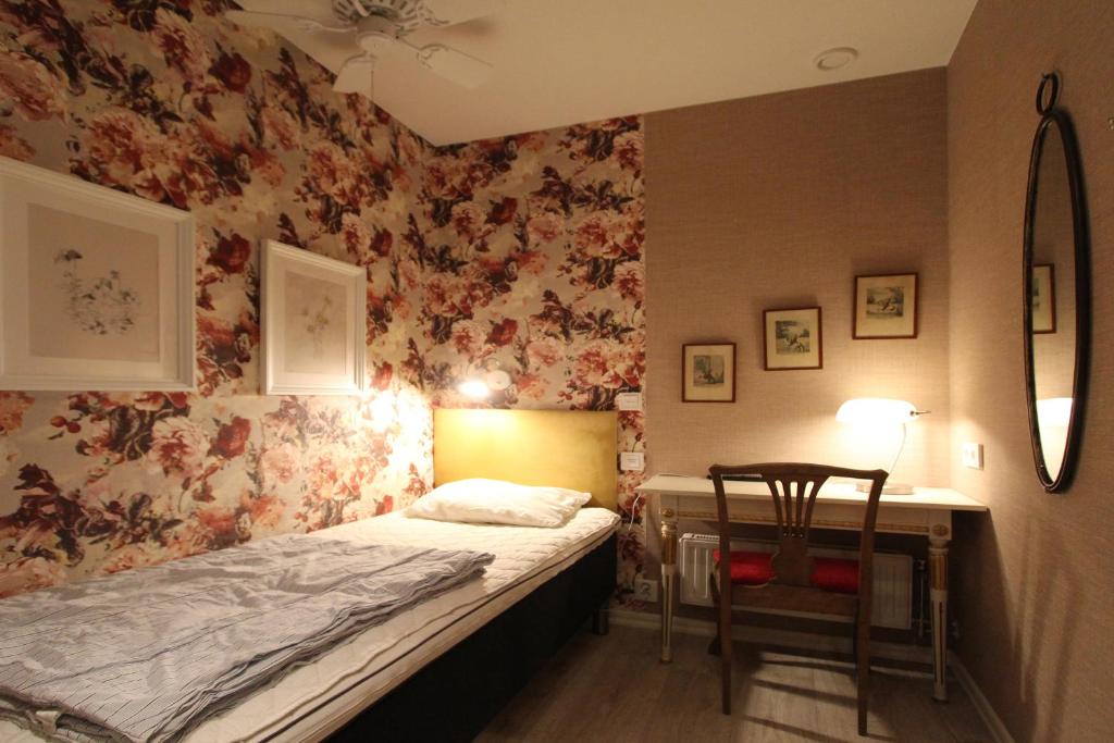 Postel nebo postele na pokoji v ubytování Skanstulls Boutique Hostel