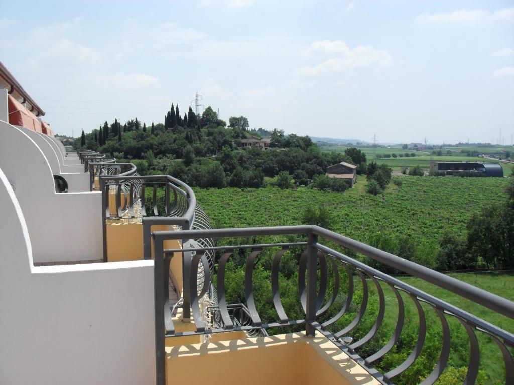 A balcony or terrace at Eurocongressi Hotel