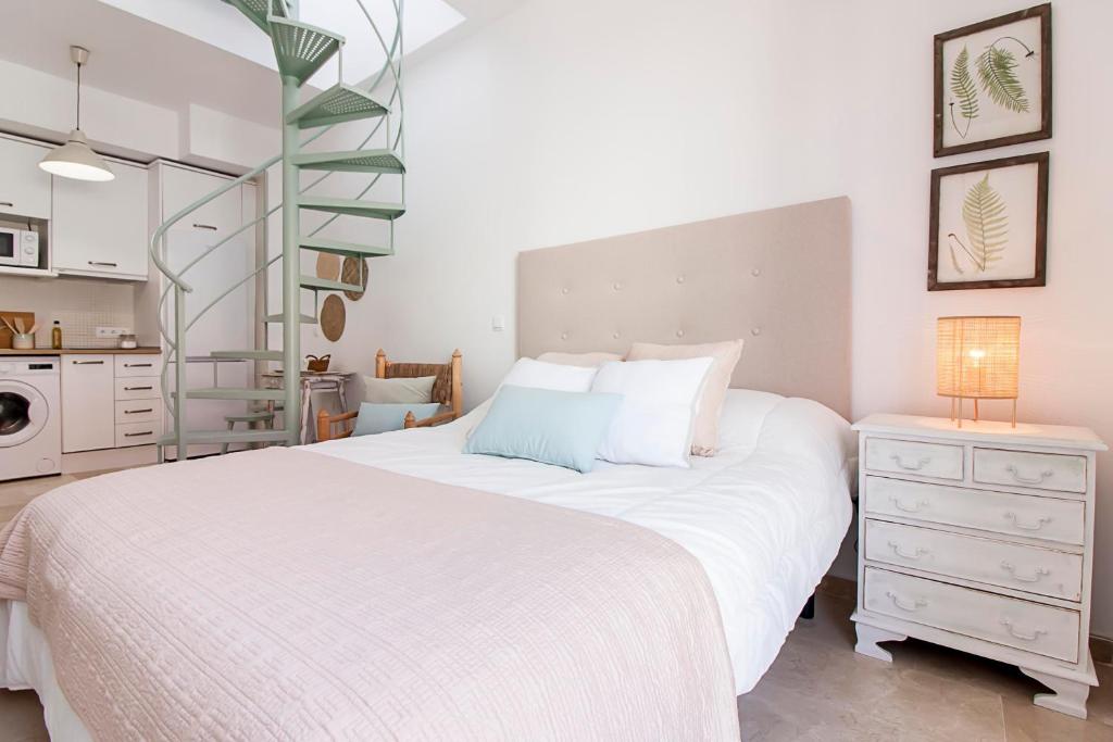 Posteľ alebo postele v izbe v ubytovaní Cervantes FreshApartments