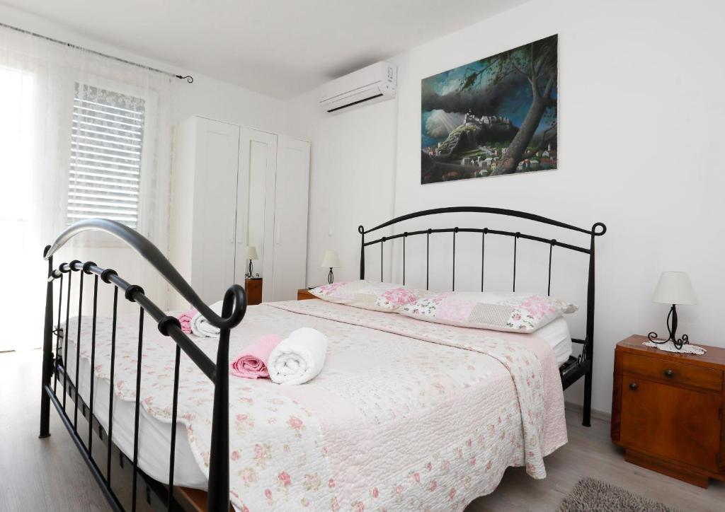 Postel nebo postele na pokoji v ubytování Holiday Home Miklica