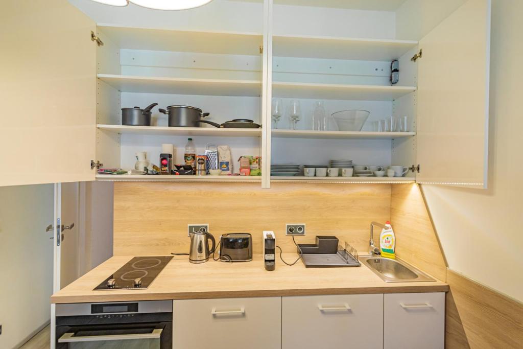 Kuchyň nebo kuchyňský kout v ubytování Business Studio Andel, 10 min to Centre, NETFLIX, Paid Parking