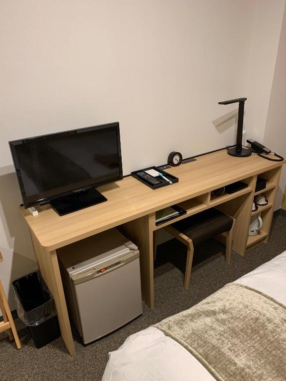 TV a/nebo společenská místnost v ubytování Matsue Urban Hotel