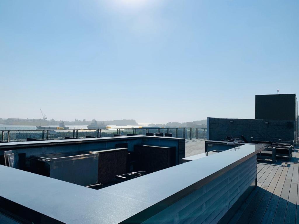 a roof of a building with a view of the water at City Suites - Kaohsiung Chenai in Kaohsiung