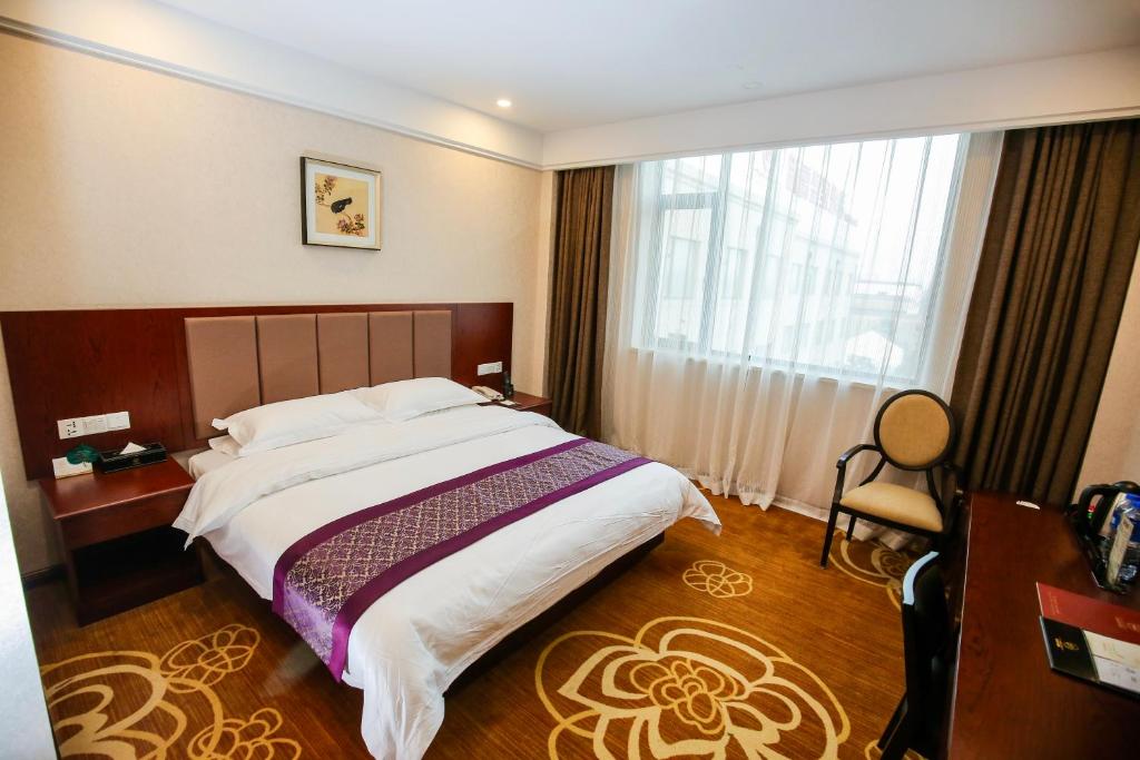 Postel nebo postele na pokoji v ubytování New Knight Royal Hotel Airport and International Resort