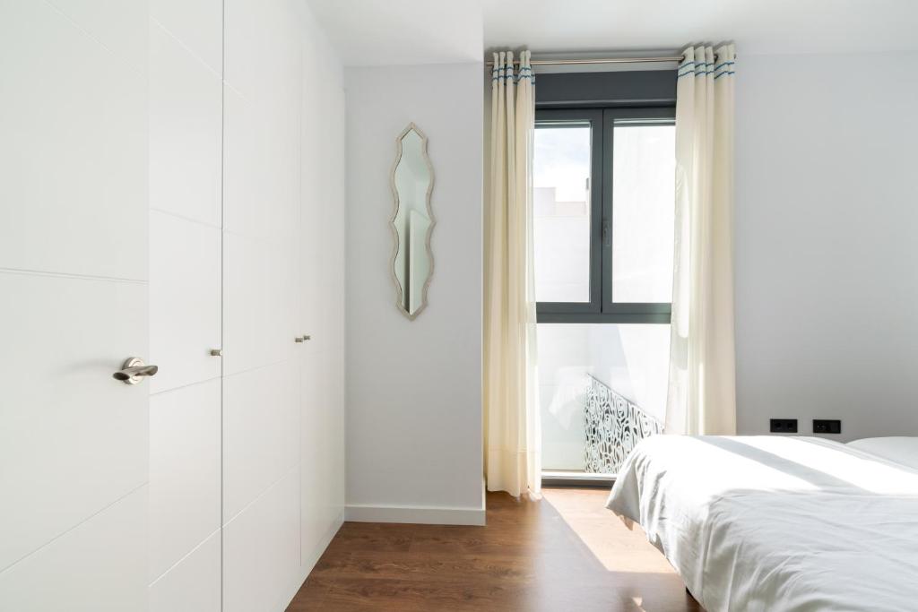 Postel nebo postele na pokoji v ubytování Veoapartment San Lorenzo