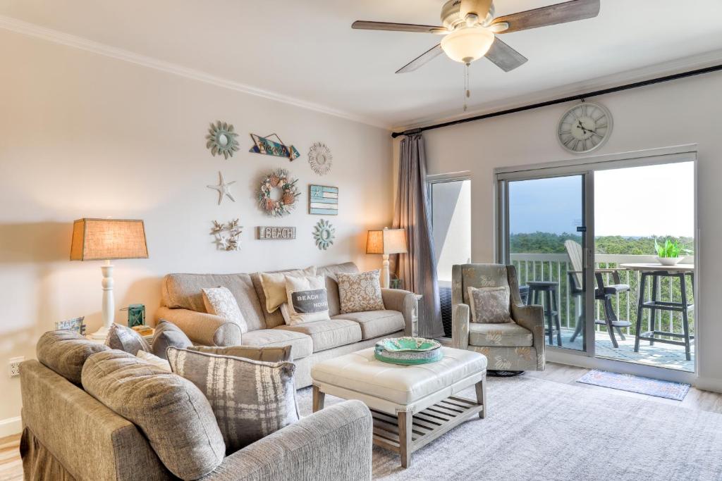 a living room with a couch and two chairs at TOPS'L Summit IV in Destin