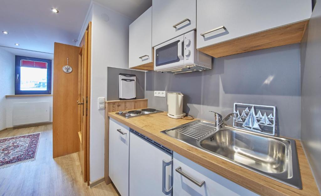 Kuchyňa alebo kuchynka v ubytovaní Appartement zum Turm Top 4