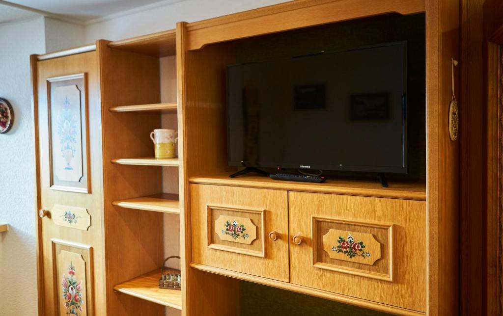 Televízia a/alebo spoločenská miestnosť v ubytovaní Appartement zum Turm Top 4