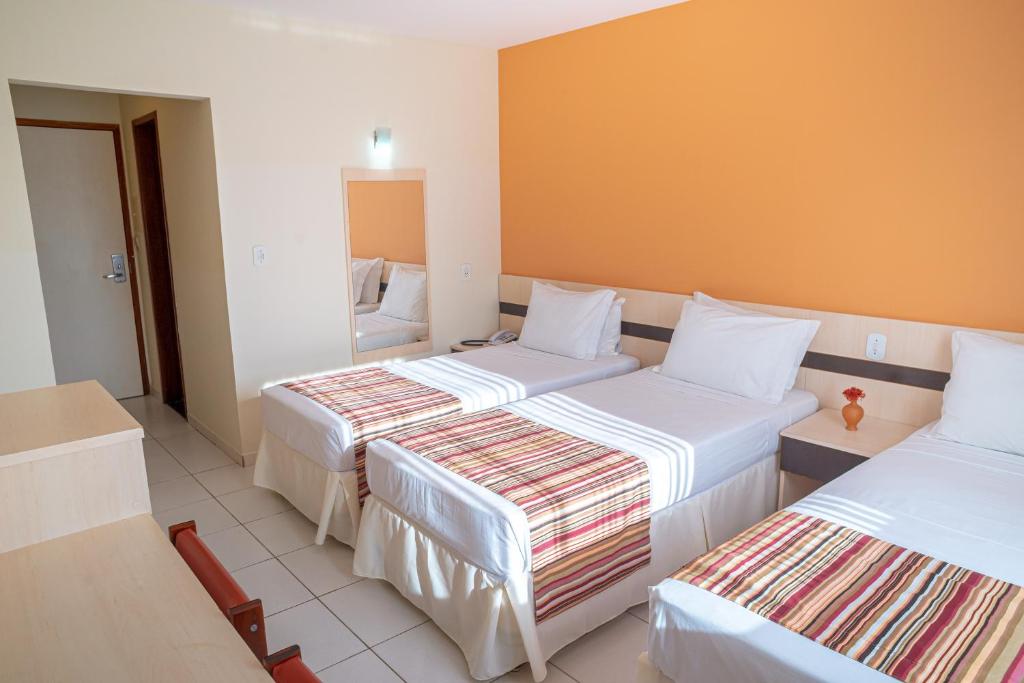 Cama ou camas em um quarto em Portobello Park Hotel