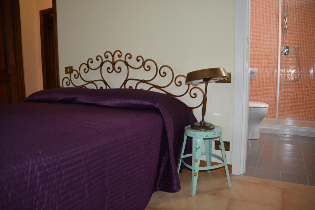 Postel nebo postele na pokoji v ubytování B&B San Russorio
