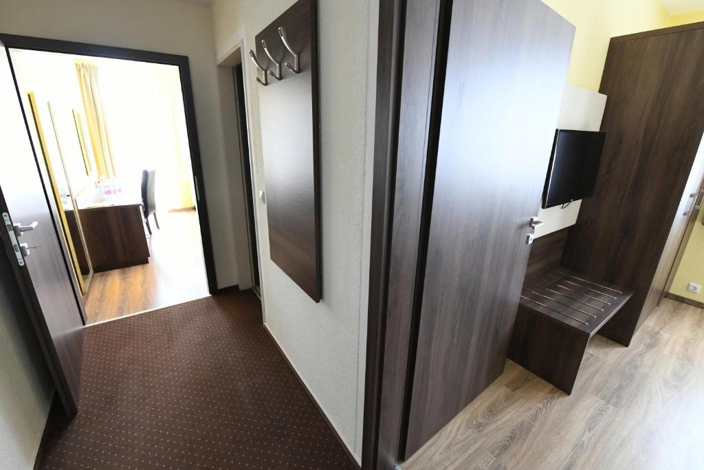 TV a/nebo společenská místnost v ubytování Jade Hotel-Ezüsthíd Hotel