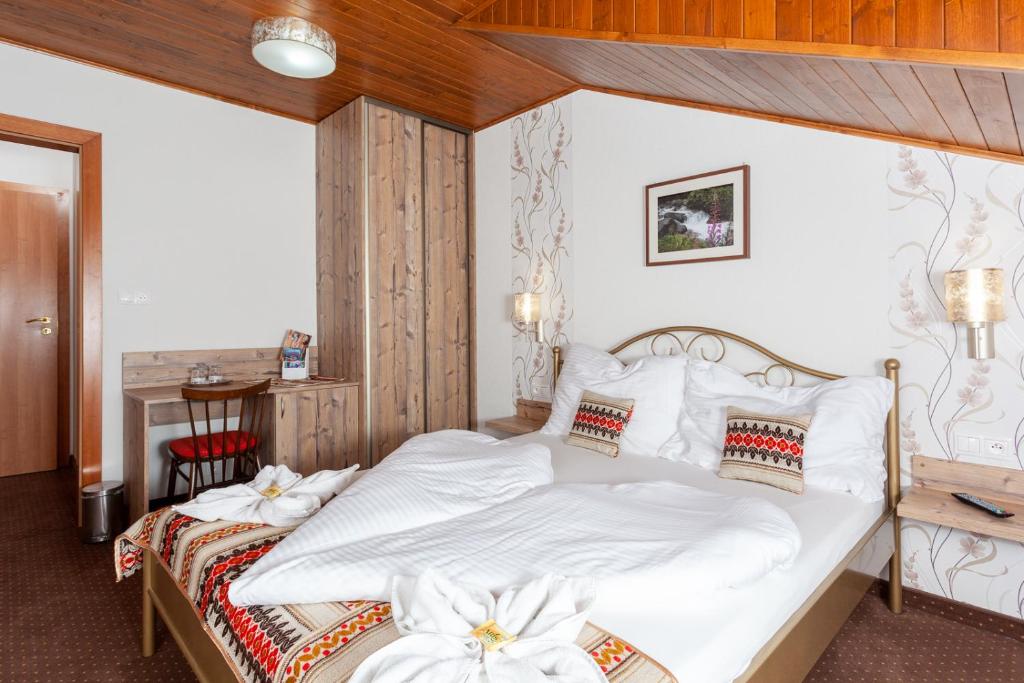Postel nebo postele na pokoji v ubytování Goralturist
