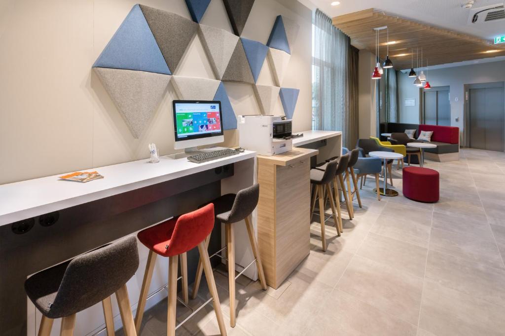 TV a/nebo společenská místnost v ubytování Holiday Inn Express - Erlangen by IHG
