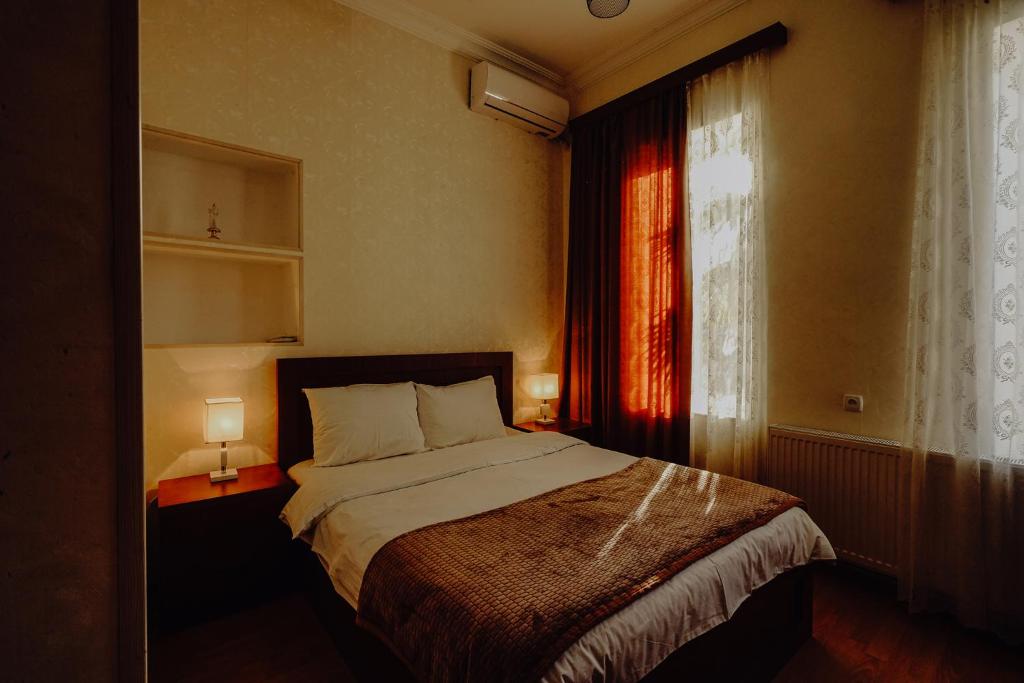 Postel nebo postele na pokoji v ubytování Hotel Eurica