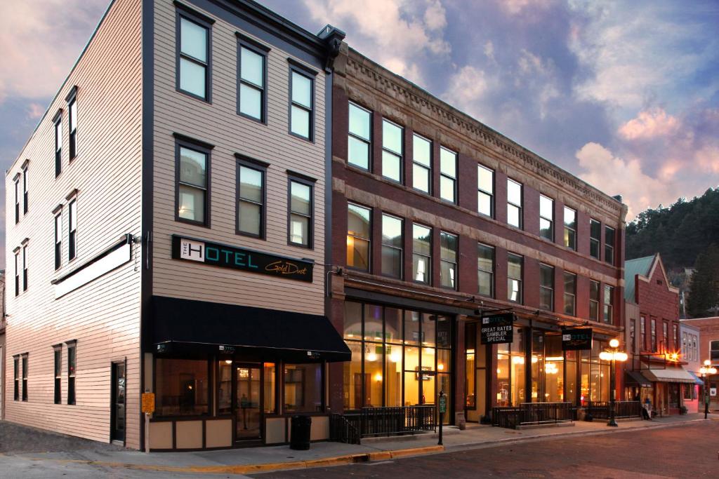 a building on the corner of a street at The Hotel by Gold Dust in Deadwood