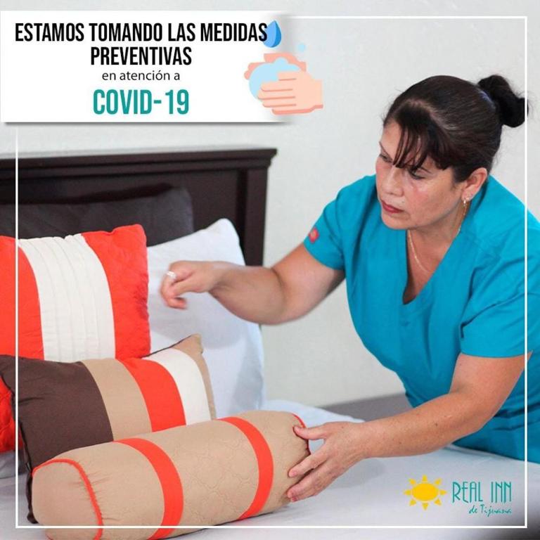 Postel nebo postele na pokoji v ubytování R INN de TIJUANA