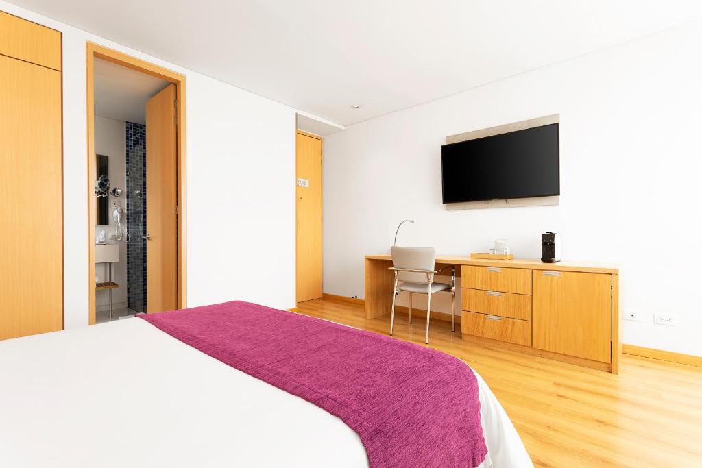 TV a/nebo společenská místnost v ubytování Hotel bh Parque 93