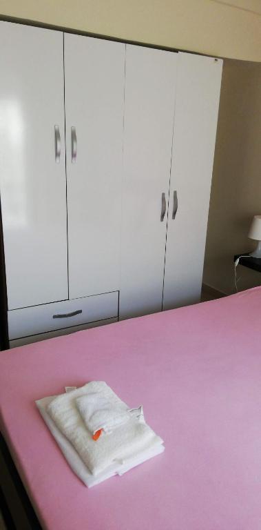 Posteľ alebo postele v izbe v ubytovaní Apartment by the Beach