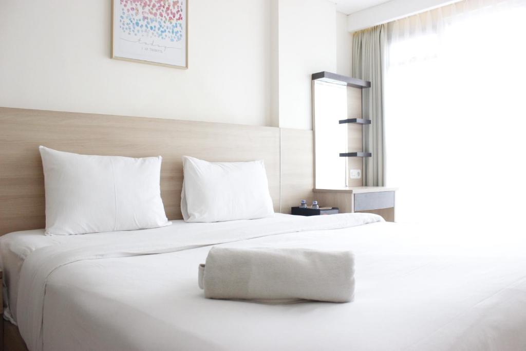 Bright Studio Room Gateway Pasteur Apartment By Travelio