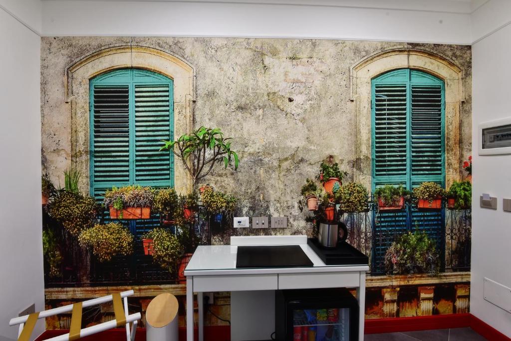 Fotografie z fotogalerie ubytování ANFITEATRO LE SUITES v destinaci Catania