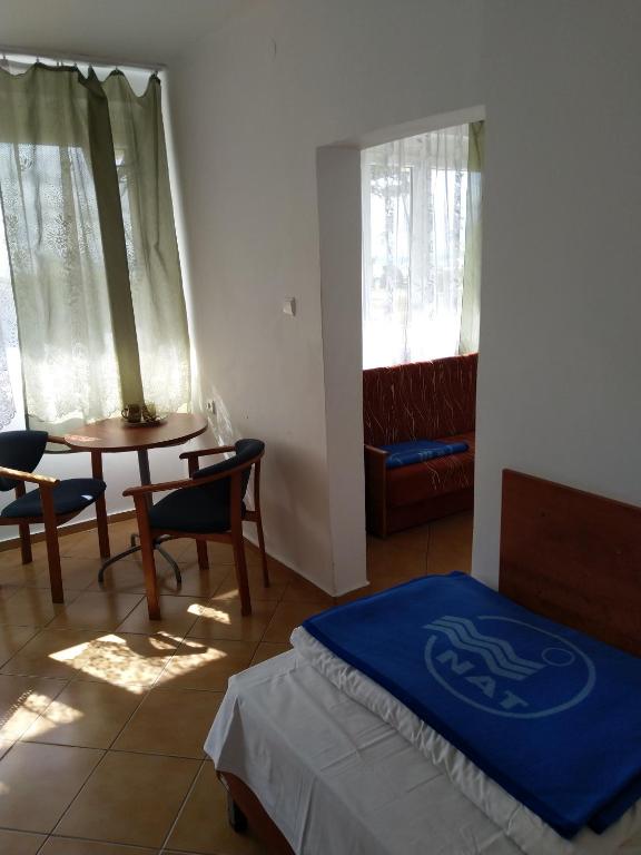 Postel nebo postele na pokoji v ubytování OW Posejdon Jastarnia - blisko morza i nad zatoką