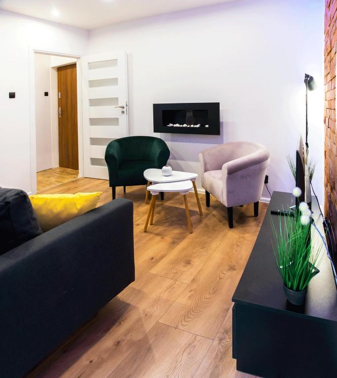 TV a/nebo společenská místnost v ubytování Apartament Gosia
