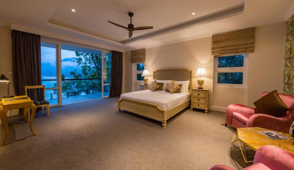 Postel nebo postele na pokoji v ubytování Villa Serenity
