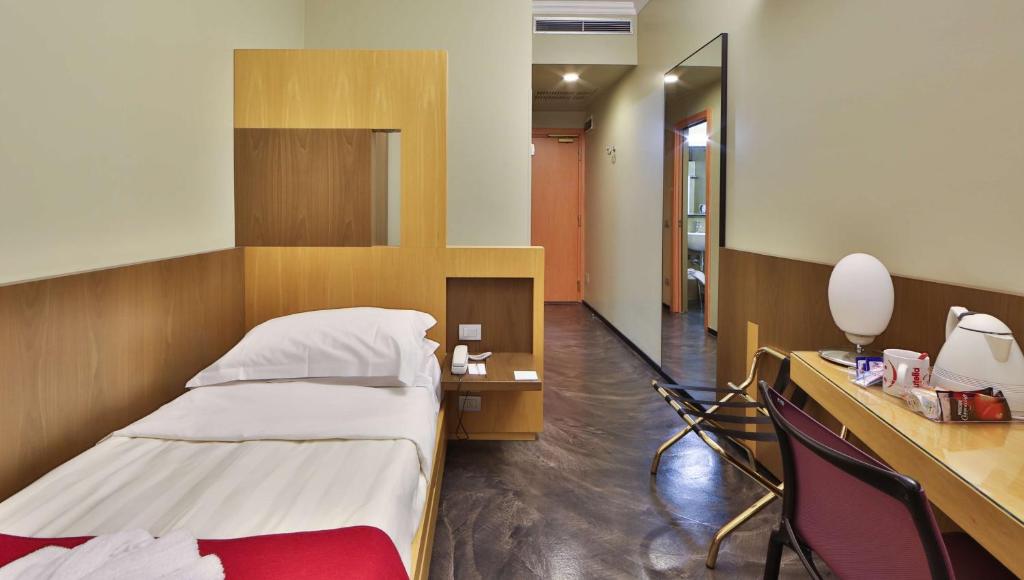 Postel nebo postele na pokoji v ubytování Best Western Hotel Major