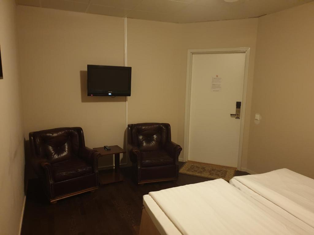 TV a/nebo společenská místnost v ubytování Hotel Expo Stockholm